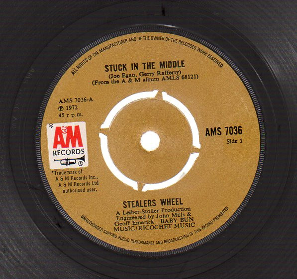 Stealers Wheel - Stuck In The Middle (7", Single, Pus)